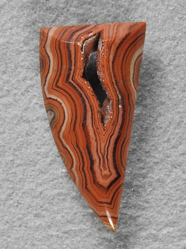 Dryhead Agate 424  :  This cab I need to acid out that Calcite to show the druzy.