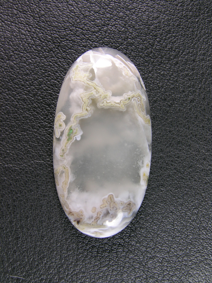 Horse Canyon Agate 752  :  Delicate tubes with different color moss centers around this cab.
