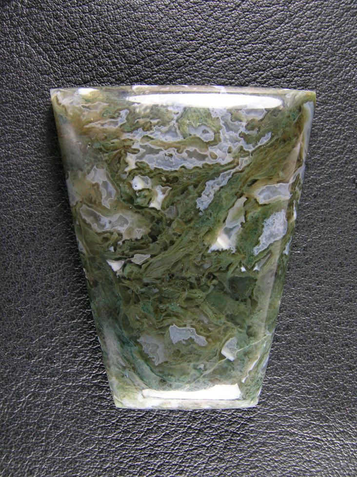 Horse Canyon Moss Agate 744  :  a bola cab shape with the classic Horse Canyon Green Moss and Blue Agate fills.