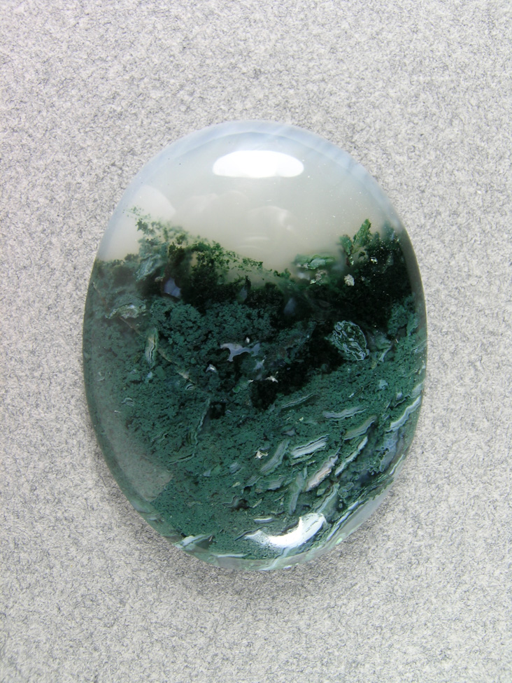 Horse Canyon Moss Agate 748  :  Light and dark Moss with a bright White Agate fill at the top.  Very nice traditional cab.