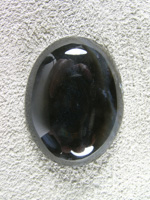 Horse Canyon Agate 713  :  A Black Agate from the Red Clay area of Horse Canyon.  It has some sparkles of Marcasite in the stone but just look at the reflection of my fingers and camera in the stone.