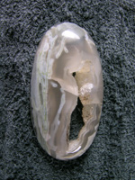 Horse Canyon Agate 717  :  White Opal tube with a Crystal pocket.