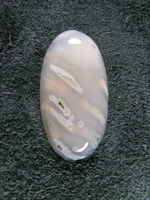 Horse Canyon Tube Agate 759  :  A traditional ellipse cab with the clean Milky Agate and straight White tubes and Green Moss centers.