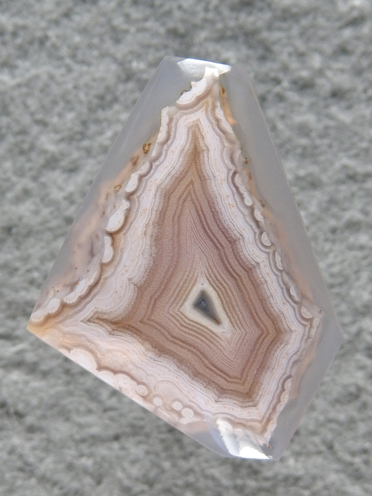 Laguna Agate 12  :  Floating in gemmy Agate this White fortification is perfect.