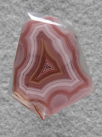 Laguna Agate 11  :  Again a floater in gemmy clear this multi colored pastel beauty has a fantastic shadow effect.