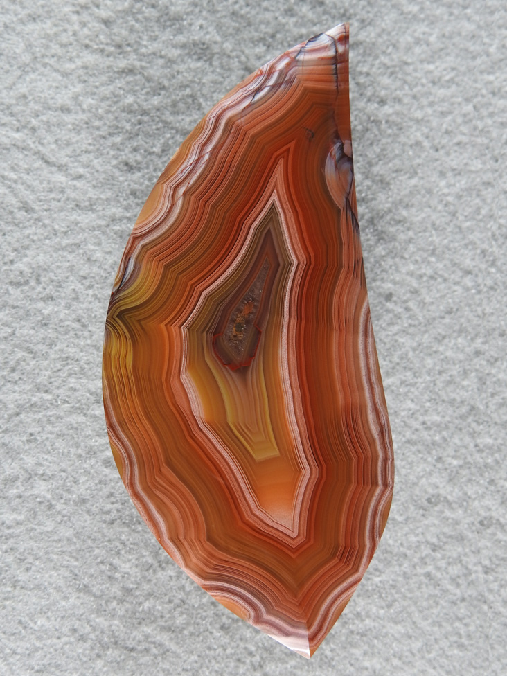 Laguna Agate 72  :  I love this cab.  It is very large and has intense colors and a very deep shadow effect.  Truly a stunning cab.