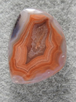 Laguna Agate 1493 : The Orange in this stone reminds me of 50/50 bars. A pretty Laguna.