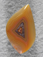 Laguna Agate 1499 No imperfections in this Laguna Yellow banded with a small crystal center. Mirror polish like most