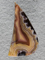 Laguna Agate 56  :  This was a narrow section off a slab.  That pattern, contrast and color just yelled save me and it has been reborn.