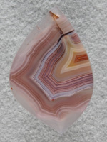 Laguna Agate 63  :  Multi color and gemmy bands in yet another nice Laguna.  Only problem in this one is the healed fracture at top that obviously trapped some Iron.