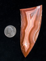 Laguna Agate 69  :  A huge Laguna!  One of 2 that I cut on such a large scale, dealer got one and I kept this one.  This one also exhibits great shadow effects.  A spectacular piece for it's size color and shadow from such a famous location.