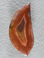 Laguna Agate 72  :  I love this cab.  It is very large and has intense colors and a very deep shadow effect.  Truly a stunning cab.