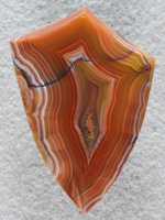 Laguna Agate 74  :  Another cab from the same piece as 72.  Wonderful colors and shadows.  The fracture is naturally healed but I am torn between keeping the full pattern and re-cutting this stone to remove the dark line.  Either way it is gorgeous.