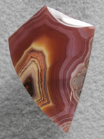 Laguna Agate 75  :  Almost a Plum color with these Yellow centers in a very galssy stone.  Lagunas are amazing in quality.