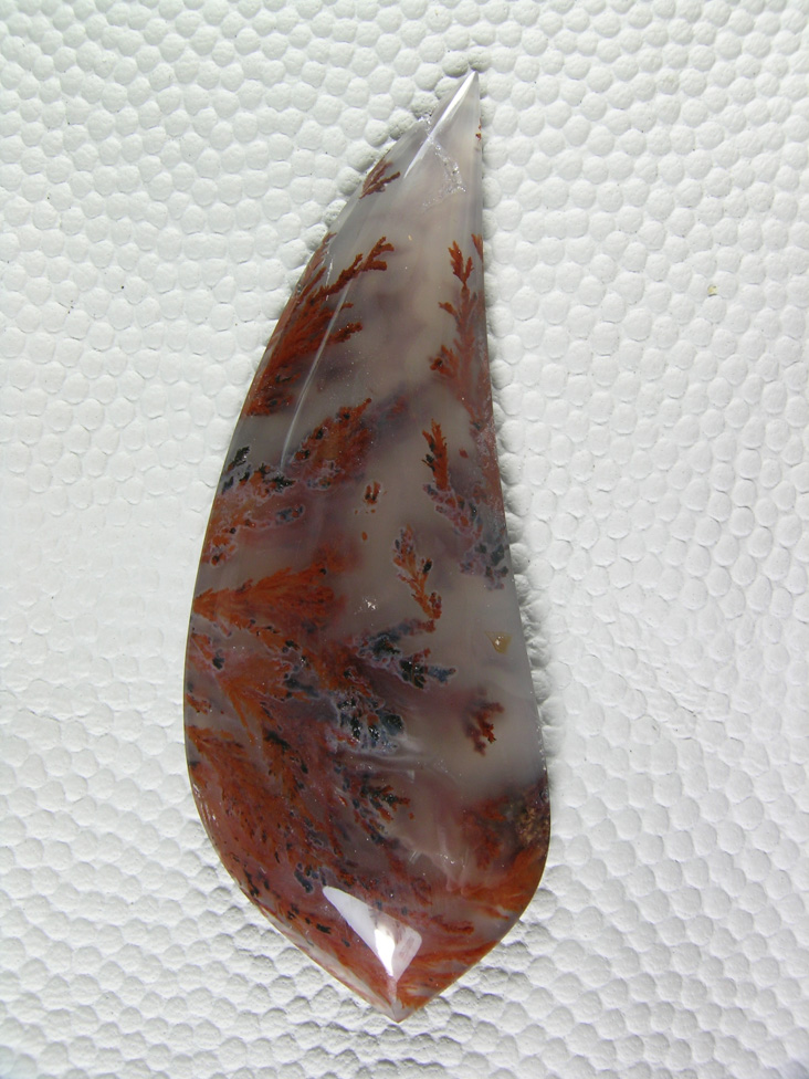 Traded Laguna Agate 105T  :  You would think Woodward Ranch but this is a Laguna.  I did a perfect job of keeping those plumes leading up towards the tip.  Having a top grade stone to cut sure helps. I am sure the dealer kept this for his personal collection.