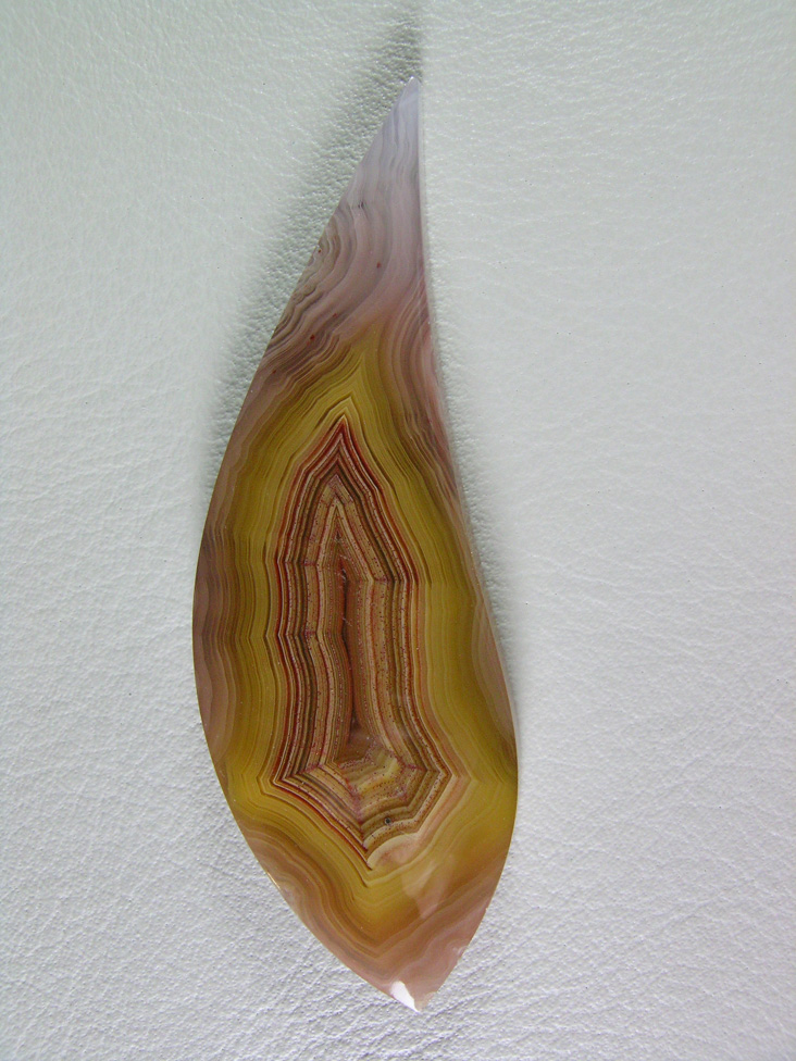 Traded Laguna Agate 113T  :  This Lemon Yellow fortification is great and has a glass polish.