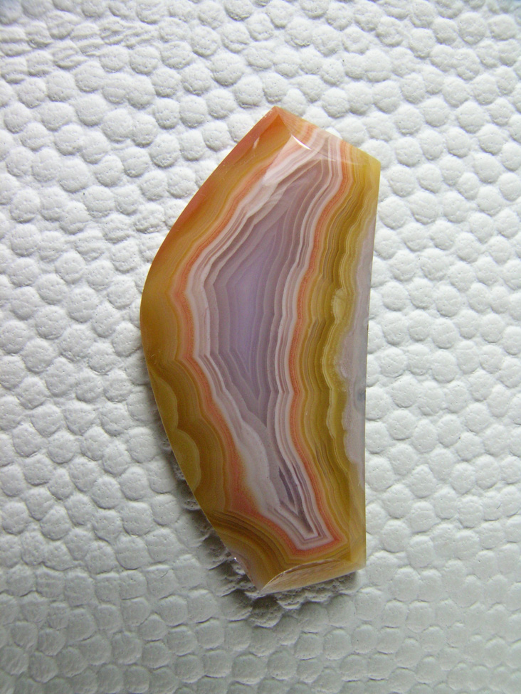 Traded Laguna Agate  130T  :  A small cab with the great colors and tight bands.