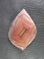 Traded Laguna Agate 109T  :  I thought it was amazing that I got to keep 2 of the 3 stones I cut of this but that only means that there was something better the dealer wanted from his pick.  Another just fabulous stone, flawless and perfect.