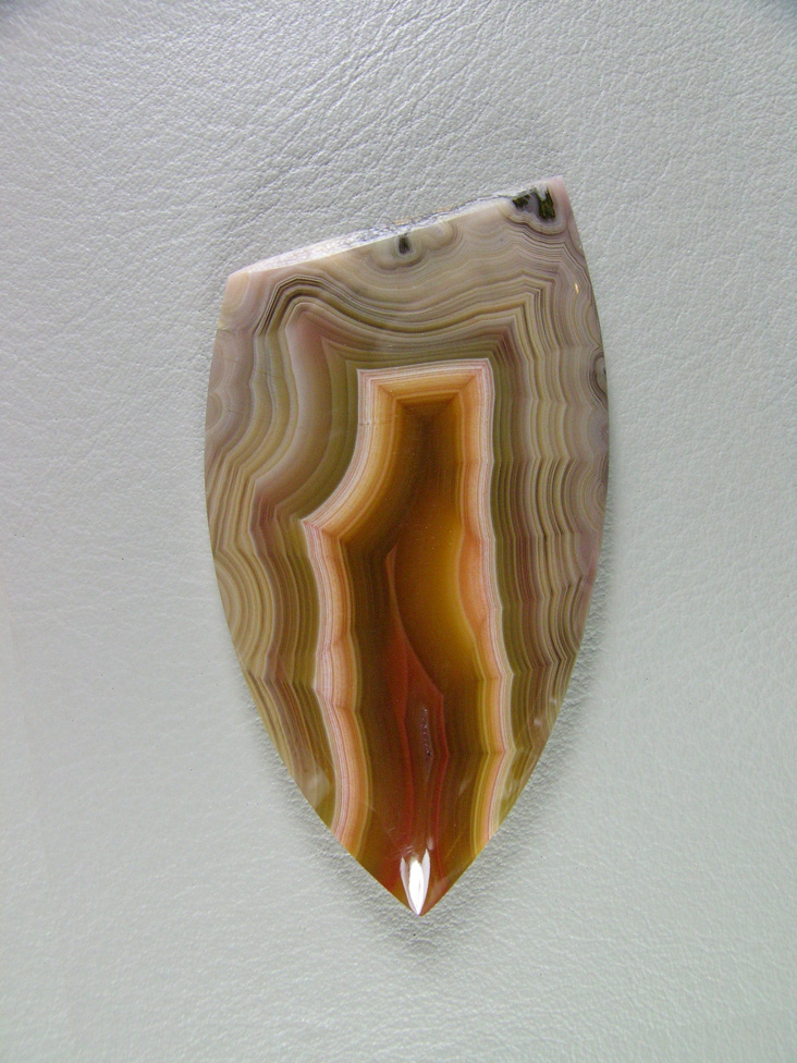 Traded Laguna Agate 121T  :  I had 2 slabs of this stone and both made exceptional cabs.  Gemmy and a great shadow effect like many of the Lagunas.