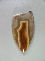 Traded Laguna Agate 121T  :  I had 2 slabs of this stone and both made exceptional cabs.  Gemmy and a great shadow effect like many of the Lagunas.