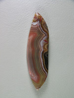 Traded Laguna Agate 126T  :  Super tight bands set off this nice cab in a multitude of colors.