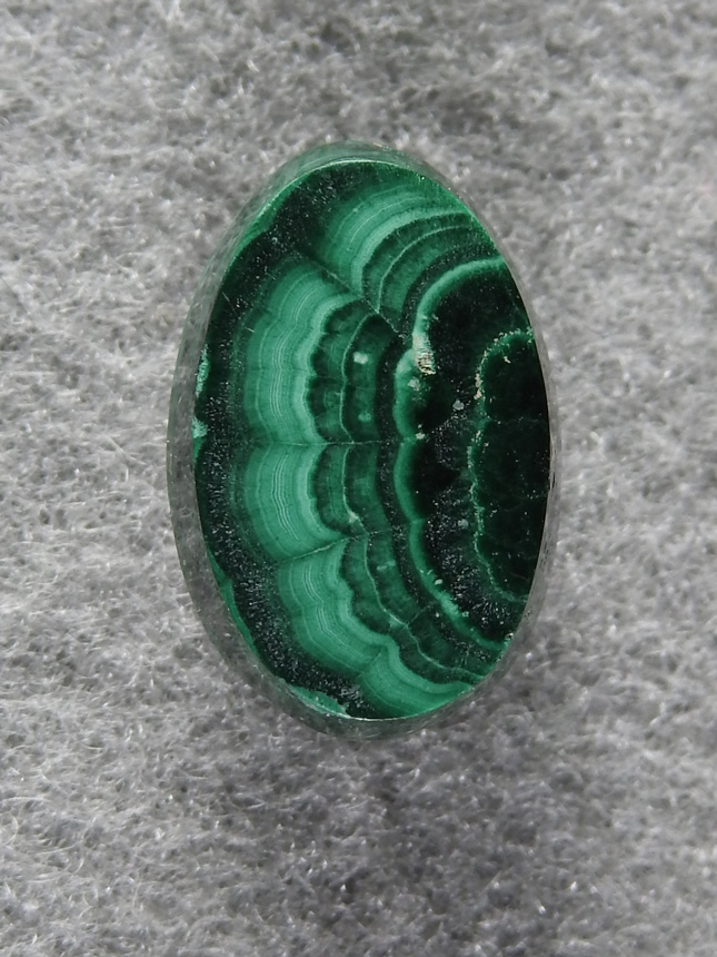 Malachite 1658 : I love the flowers in Malachite but they always tend to be small surrounded by cavities, still cuts a nice stone.