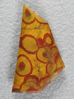 Morgan Hill Jasper 798  :    Ochre Yellows with nice bright Red orbs.   This is very good Morgan hill and quite large cabs.