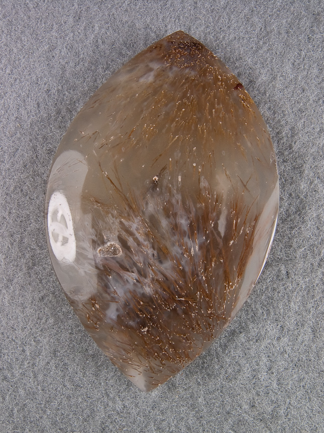 Nipomo Sagenite Agate 1258  :  A super fan of needles from top and bottom.  Glassy cab.