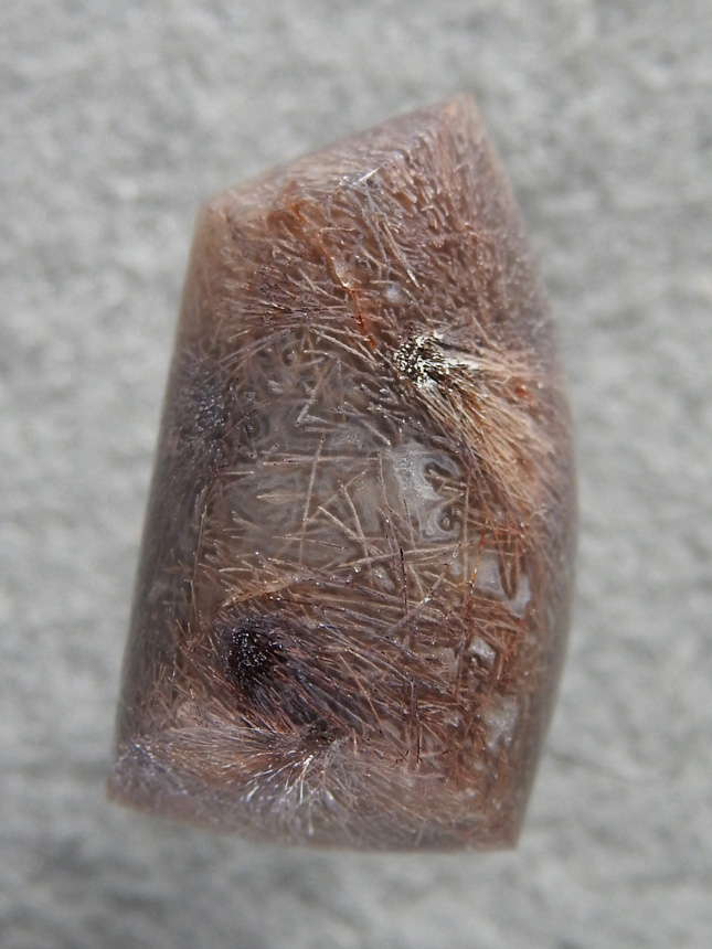 Nipomo Sagenite Agate 813  :  Lovely Lavendar coloered needles in this small cab.  Definately one of the harder colors to find.