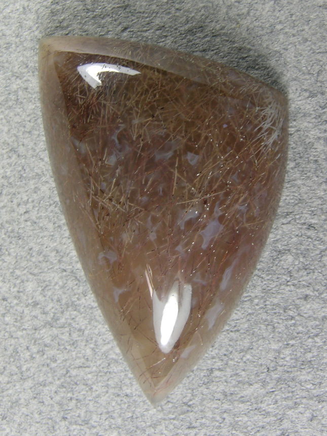 Nipomo Sagenite Agate 816  :  A subtle cab with delicate needles in a Rasberry Agate.