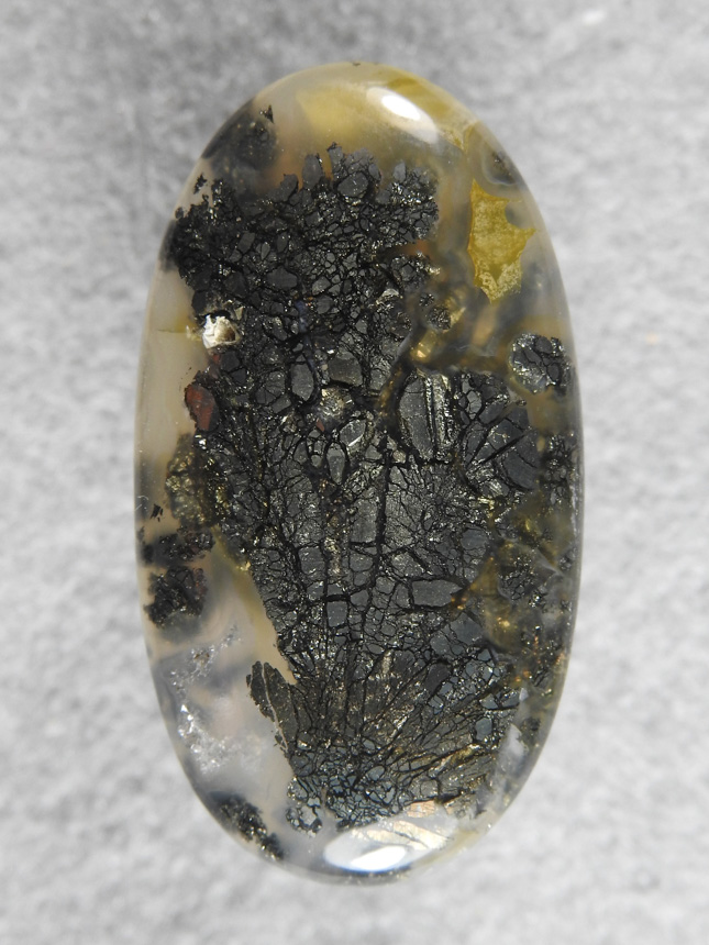 Nipomo Marcasite Agate 2147 : A very nice plume of Marcasite on the face of this cab with lots of clear.