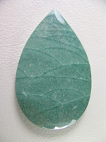 Traded Jasper 913T  :  A nice orbicular Green Jasper but the location I do not remember.  Not enough contrast to my taste and the material get the same shine I do from other Jaspers.  Those little White spots are micro pockets.