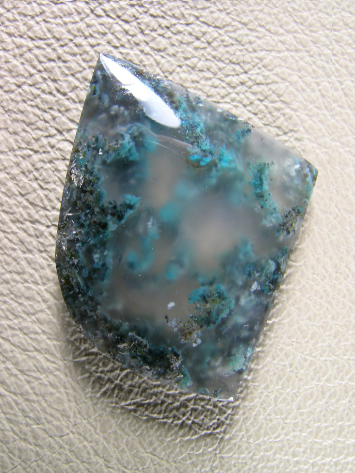 Chrysocolla plume agate 614  :   This cab I tried grinding thru the base to have the colors floating more in the middle of the cab.