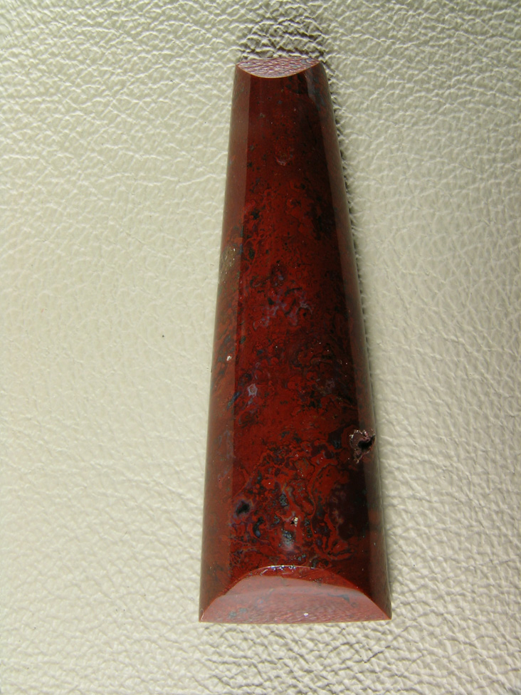 Coronary Plume Agate 644  :  A bit darker stone and more on the mossy side, 2 pits towards the bottom.