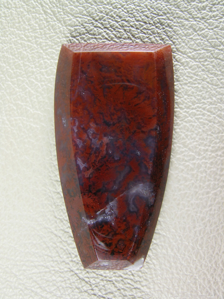 Coronary Plume Agate 651  :  A nice cut with dark to light Red Plumes and a Blue Agate backgound.