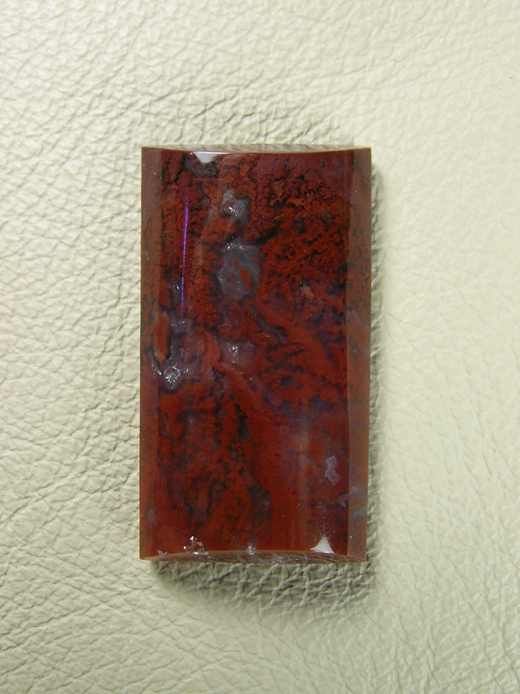 Coronary Plume Agate 665  :  A pretty hal barrel with nice plumes, a small druzy spot on the left side of the cab.