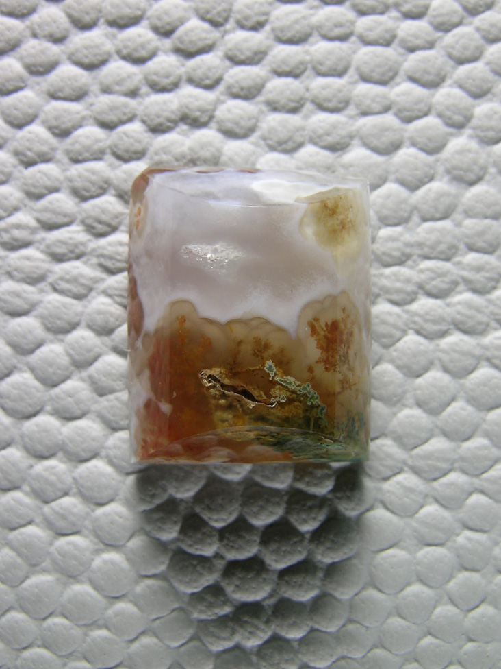 Horse Canyon Plume Agate 778  :  Reddish Golden Plumes surround the White center with some moss in the bottom right.  A pocket center bottom where moss should be.