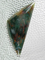 Horse Canyon Plume Agate 724  :  Simply awesome.  This is what made Horse Canyon Famous.  This cab is all plume with Green, Orange, Yellow, Black, Red and even Lavendar.  This was a piece if seam material that looked almost black from the side and was a little over 1/4