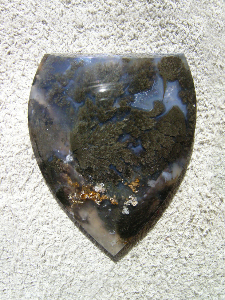 Plume Agate 531  :  A very nice cut of very pretty Plume Agate.  Very rounded sides and a negative top cut really plays up these Plumes