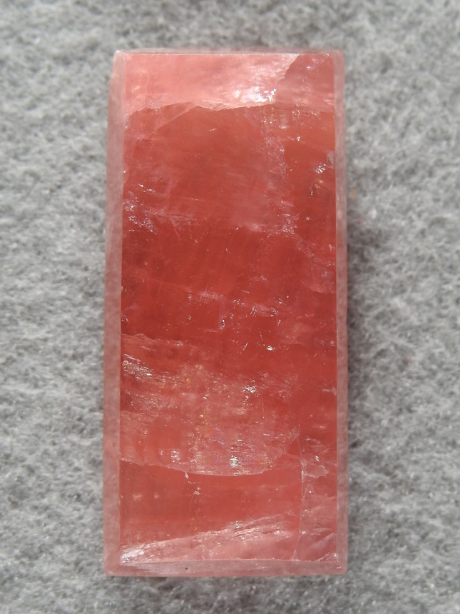 Rhodochrosite 1544 : A nice bar of Rhodochrosite, very heavy as expected for a little cab.
