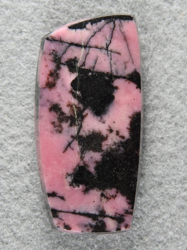 Rhodochrosite 1542 : A very nice freeform of Rhodonite. I love the contrast of the pink and Black in this material.