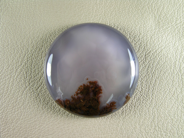 Royal Mojave Agate 933  :  An example of the stone on a light background and next dark showing the turtle shell effect.