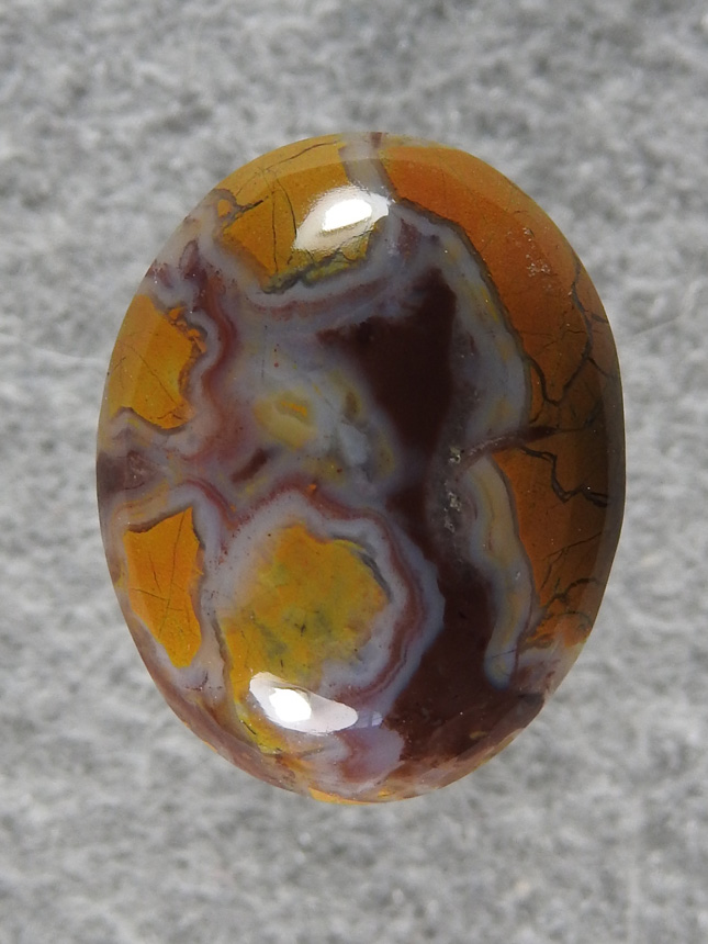 Stone Canyon Jasper 2160 : A small oval that is perfect for a ring with the great plum color.