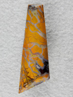 Stone Canyon Jasper 1068  :  Perfect Stone Canyon Jasper.  This cab has the Yellow Jasper with milky veins and a Plum filling in the upper left.  Glassy polish is easy with this Jasper!
