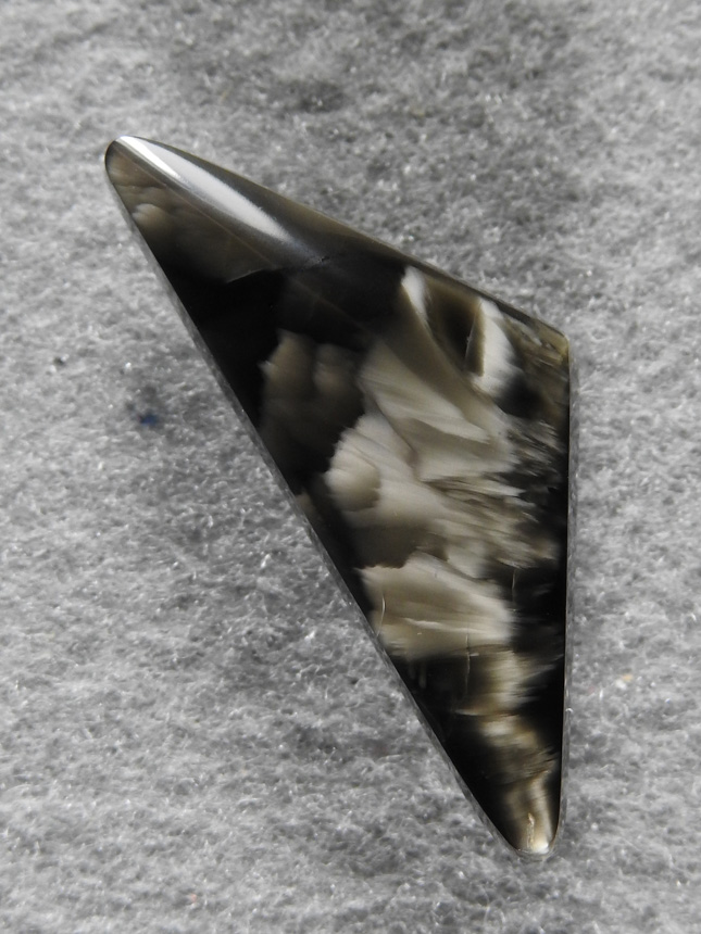 Victoria Stone 1693 : Black Victoria Stone created by Dr. Imori in the 1960's has never been duplicated.  Slender triangle.