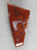 Walker Ranch Plume 477  :  Cherry Red plumes in this geometric cab of Agate from the Walker Ranch of West Texas.