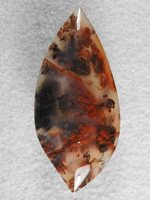Walker Ranch Plume 485  :  Red ribbons and Black Plumes make this a nice stone and would make a great pendant.